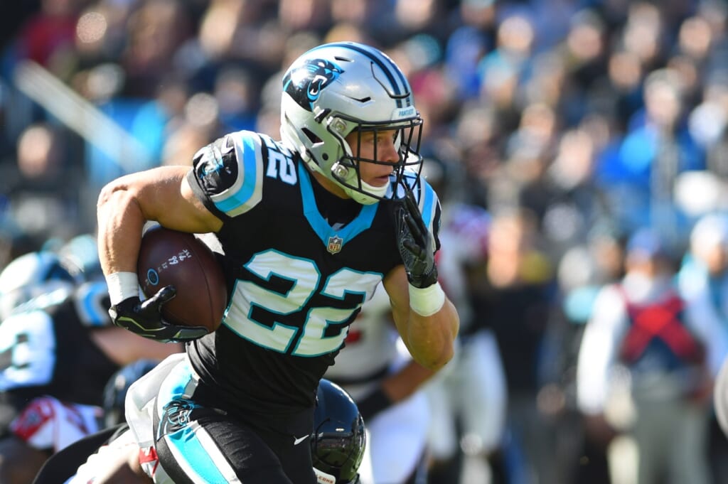 WATCH: Christian McCaffrey takes flying leap over defender, flips into ...