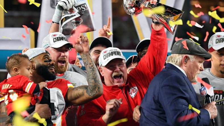 Feb 2, 2020; Miami Gardens, Florida, USA; Kansas City Chiefs head coach Andy Reid hoist the Vince Lombardi Trophy after defeating the San Francisco 49ers in Super Bowl LIV at Hard Rock Stadium. Mandatory Credit: Robert Deutsch-USA TODAY Sports