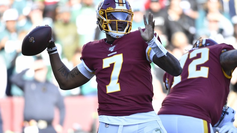 Redskins QB Dwayne Haskins attempts a pass against the Eagles.