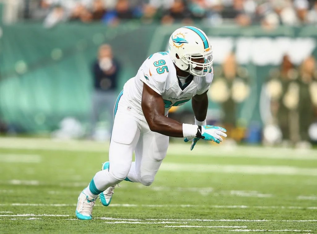 Dolphins defensive end Dion Jordan rushes the passer