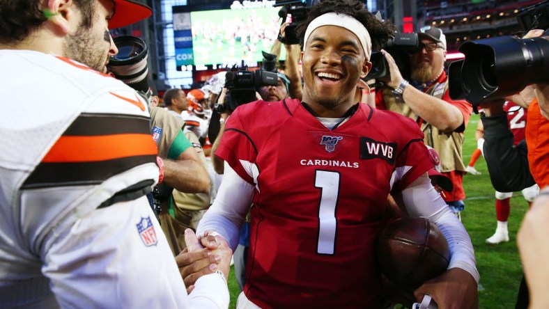 Kyler Murray talks to Baker Mayfield