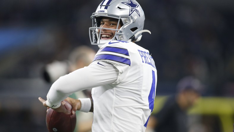 Dak Prescott throws pass before NFL game