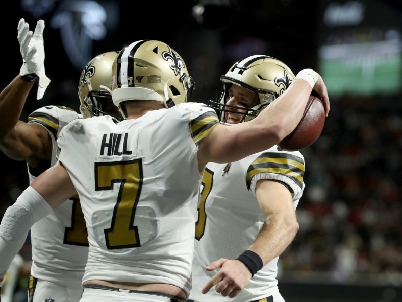 Taysom Hill and Drew Brees celebrate touchdown