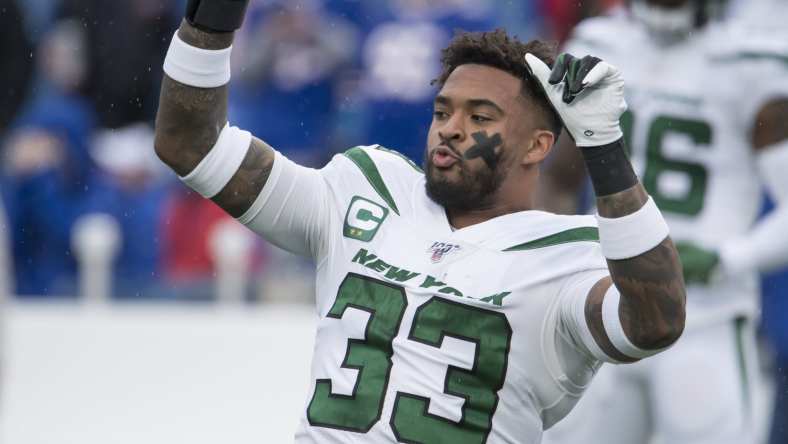 Jamal Adams warms up before game