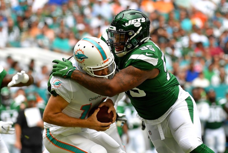 Jets Quinnen Williams sacks Ryan Fitzpatrick of the Dolphins