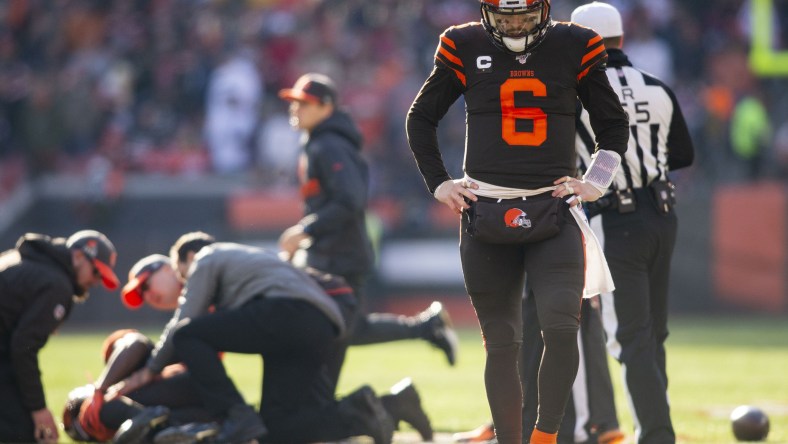 Cleveland Browns quarterback Baker Mayfield walks away following an injury.