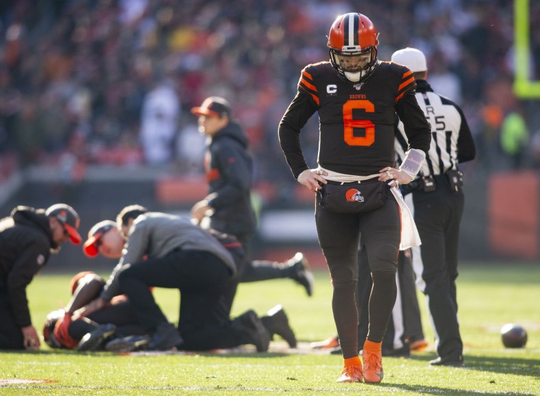 Cleveland Browns quarterback Baker Mayfield walks away following an injury.
