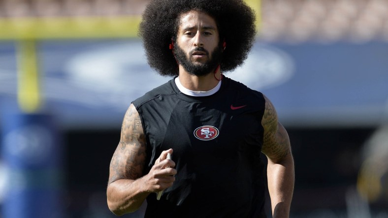 NFL QB Colin Kaepernick warms up