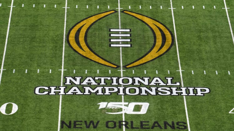 College FOotball Playoff logo at midfield