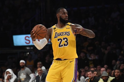 Los Angeles Lakers star LeBron James passes the ball against the Brooklyn Nets.
