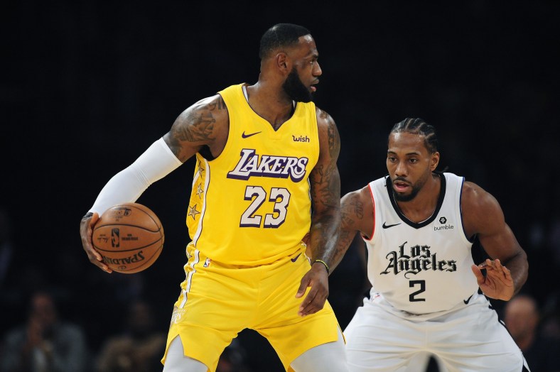Los Angeles Clippers SF Kawhi Leonard guards Los Angeles Lakers SF LeBron James
