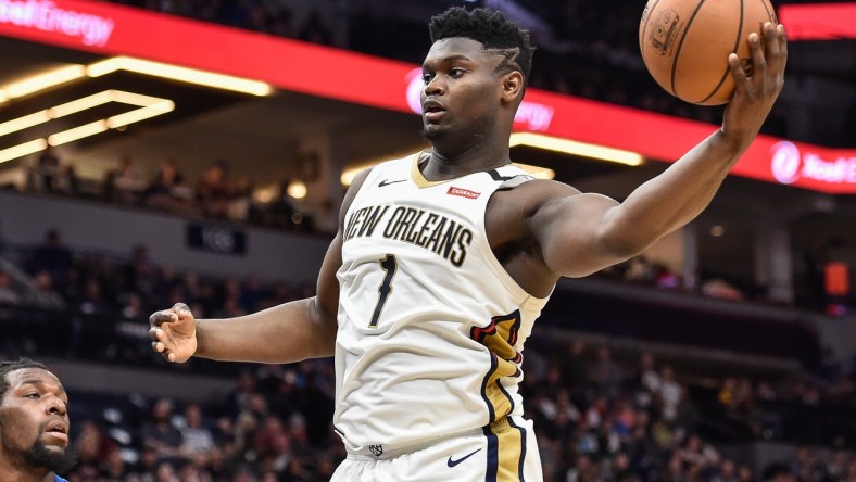 Pelicans star Zion Williamson dunks the ball against the Timberwolves