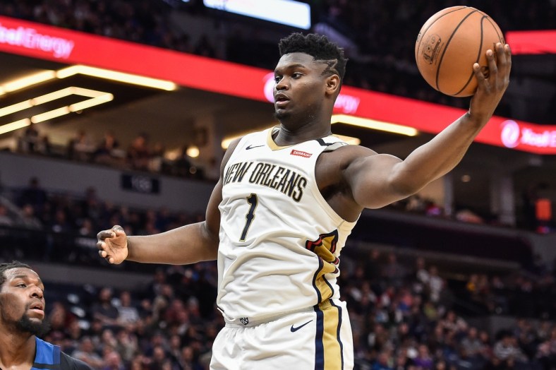 Pelicans star Zion Williamson dunks the ball against the Timberwolves