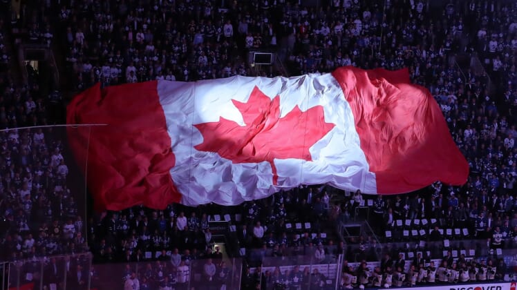 Canadian flag in Toronto crowd