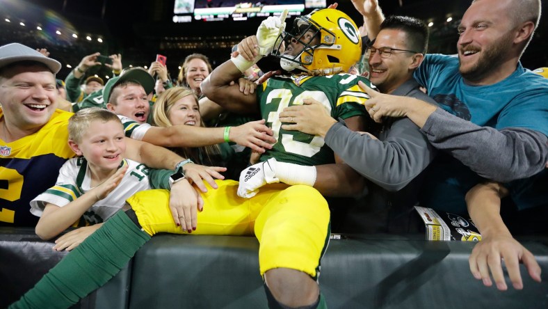 Green Bay Packers RB Aaron Jones leaps at Lambeau Field