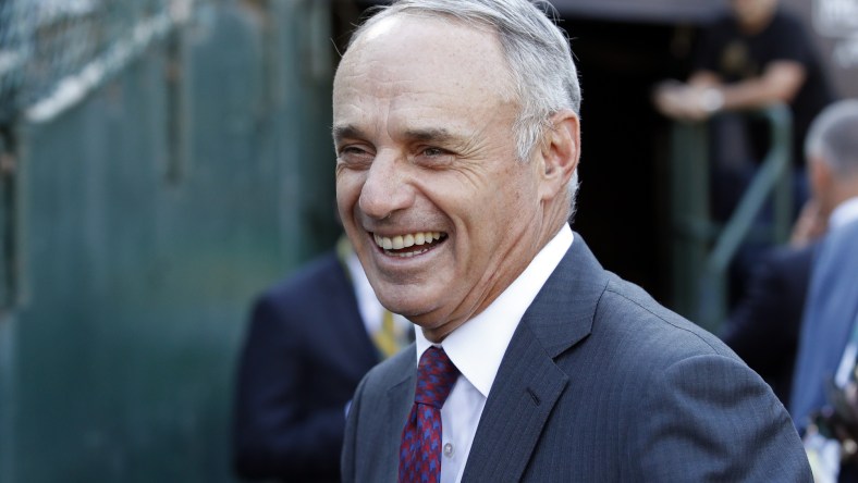 MLB commissioner Rob Manfred smiles