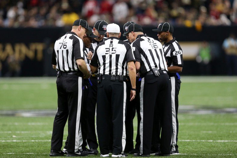NFL referees huddle during 2019 season