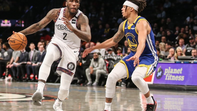 Nets' Taurean Prince drives against Warriors Damian Lee