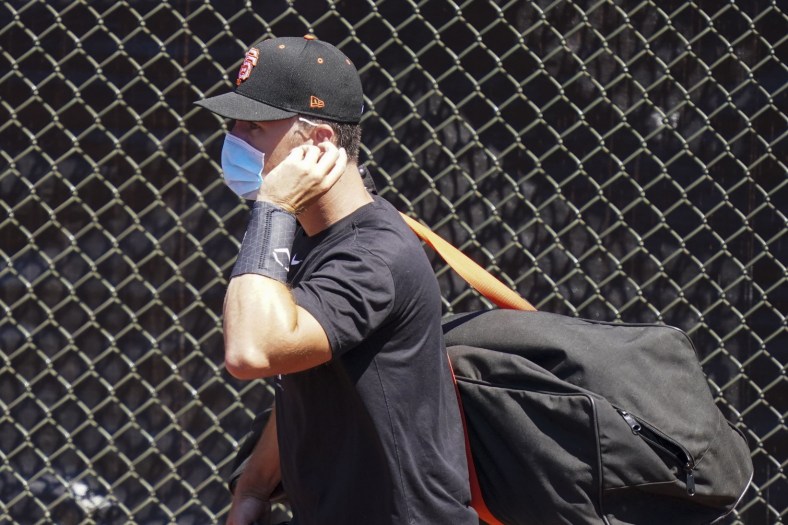Giants star Buster Posey during spring training workout