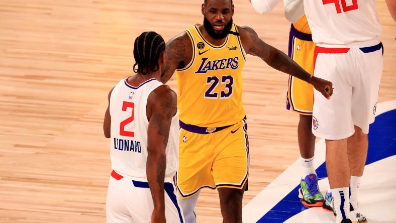 Lakers star LeBron James and Kawhi Leonard of Clippers during NBA game