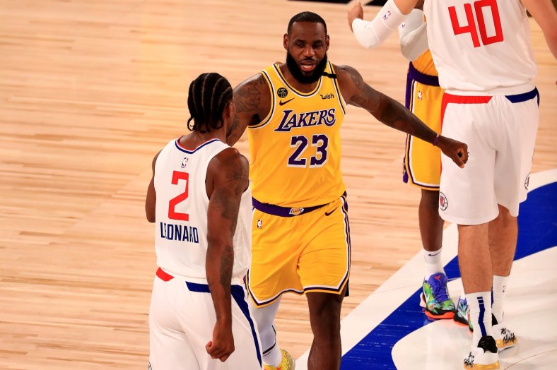 Lakers star LeBron James and Kawhi Leonard of Clippers during NBA game