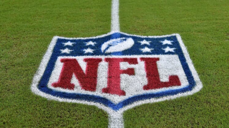 NFL logo at midfield during NFL season