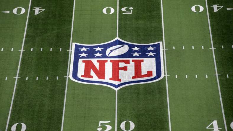 NFL shield at midfield during 2019 season