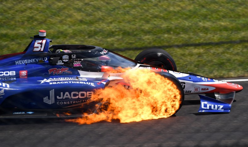 Indy Series driver James Davison 's tire catches fire during Indianapolis 500