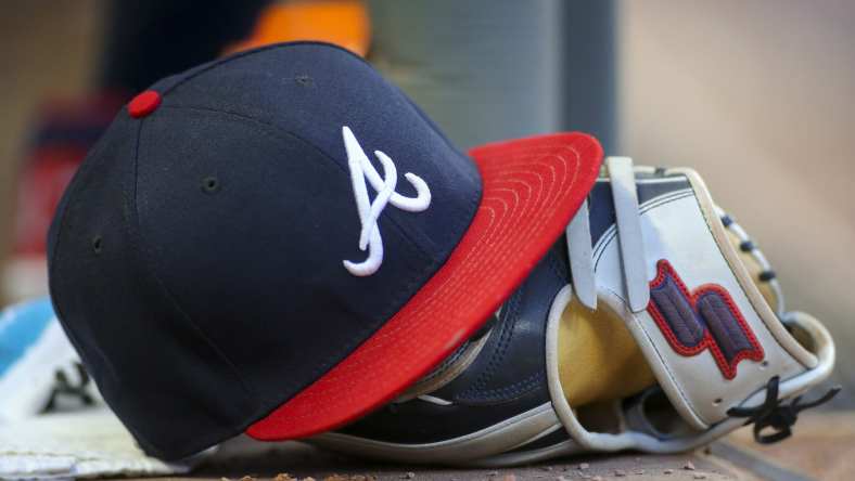 Atlanta Braves hat and glove during MLB season