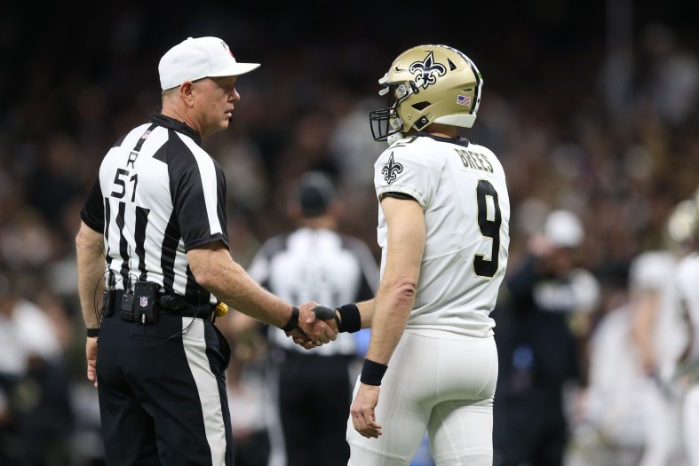 New Orleans Saints QB Drew Brees and an NFL referee