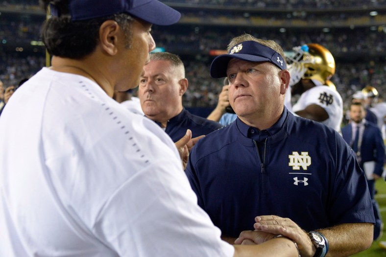 Notre Dame coach Brian Kelly and Navy coach Ken Niumatalolo