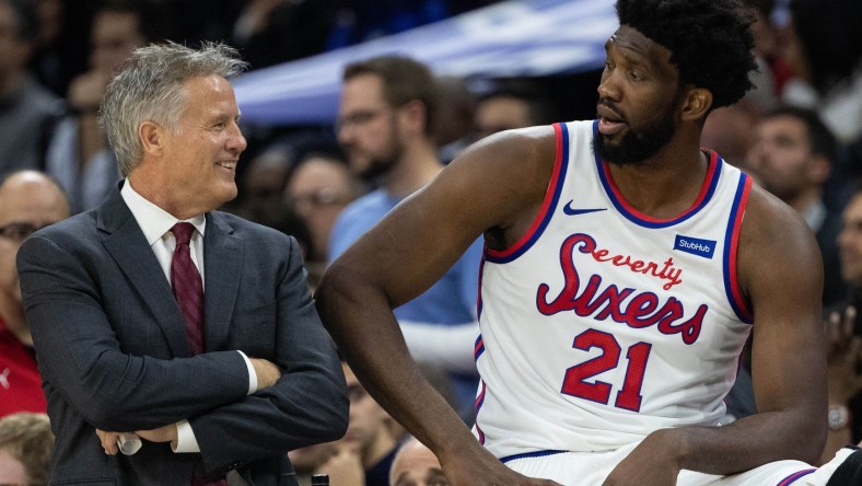 Philadelphia 76ers star Joel Embiid with coach Brett Brown