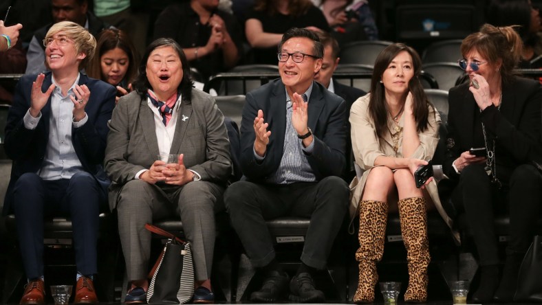 Nets owners Clara and Joe Tsai watch NBA exhibition game