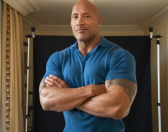 Dwayne Johnson posing for Fast and the Furious spin off.