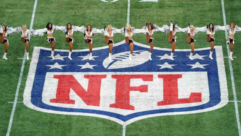 Raiders cheerleaders during NFL game in London.