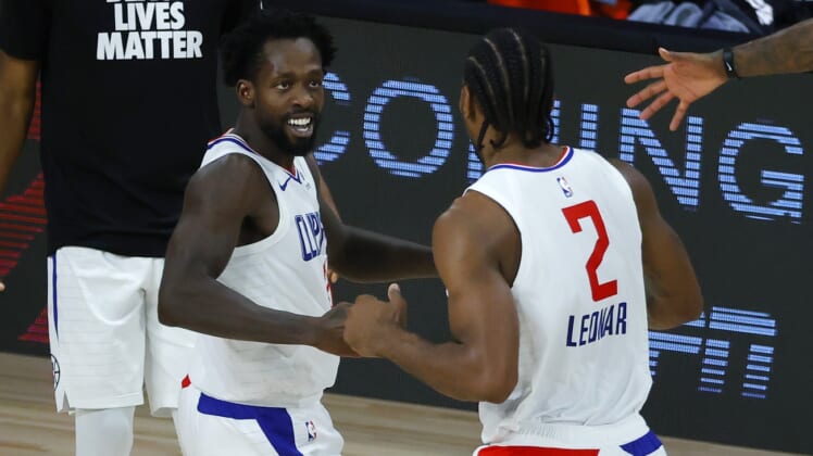 Kawhi Leonard and Patrick Beverley of the Clippers against the Pelicans