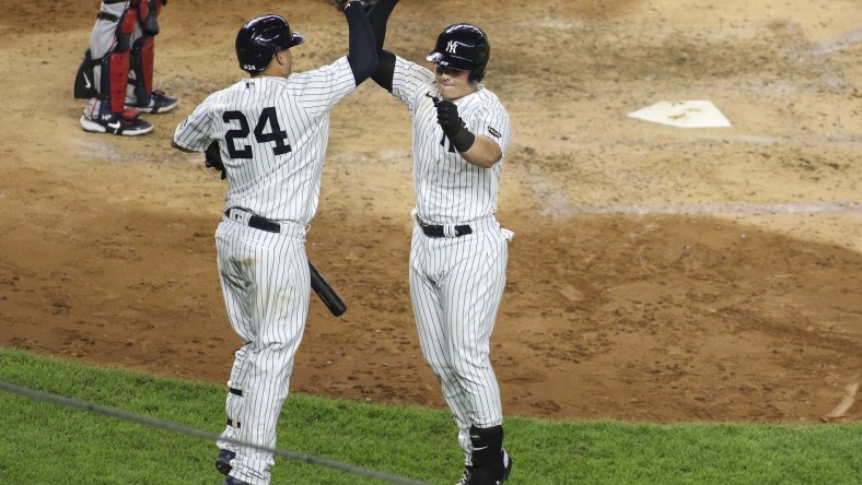 Yankees' Luke Voit celebrates after hitting HR against the Red Sox