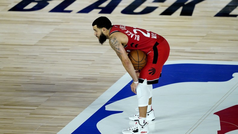 Raptors Fred VanVleet against Heat during NBA game.