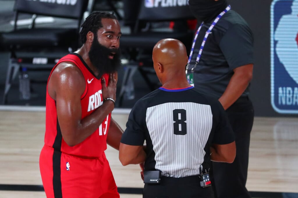 Rockets guard James Harden argues with official during NBA Playoff game against Thunder.