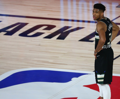 Giannis Antetokounmpo of the Bucks looks on during NBA Playoff game against the Heat