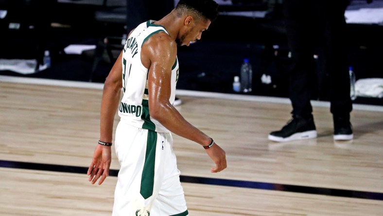 Milwaukee Bucks star Giannis Antetokounmpo walks off court