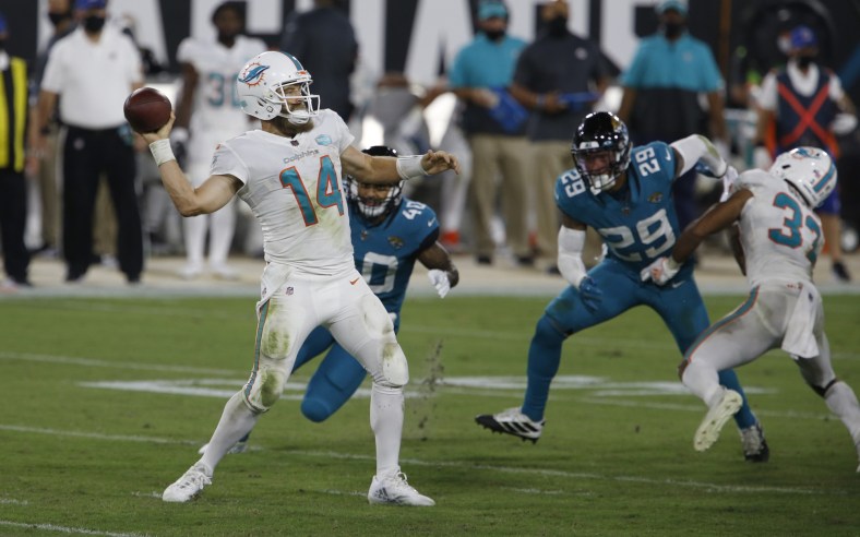 Miami Dolphins QB Ryan Fitzpatrick throws against the Jacksonville Jaguars on Thursday Night Football
