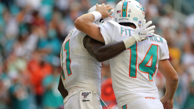 Miami Dolphins quarterback Ryan Tannehill celebrates a touchdown