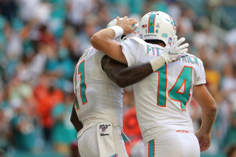 Miami Dolphins quarterback Ryan Tannehill celebrates a touchdown