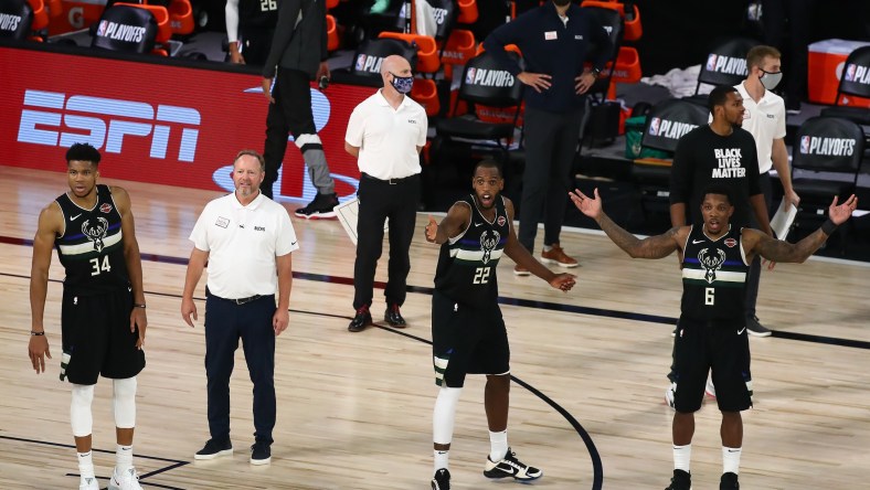 Bucks players react after Game 2 vs Heat