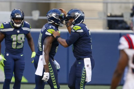 Seahawks Russell Wilson and D.K. Metcalf during NFL game against the Patriots