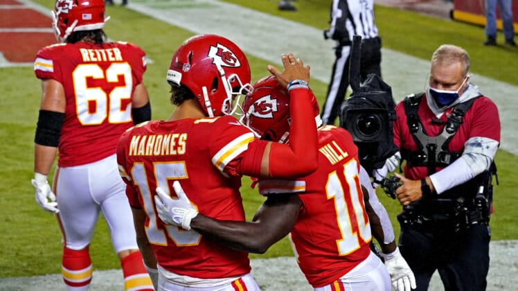 Sep 10, 2020; Kansas City, Missouri, USA; Kansas City Chiefs wide receiver Tyreek Hill (10) celebrates with quarterback Patrick Mahomes (15) after scoring a touchdown during the second half against the Houston Texans at Arrowhead Stadium. Mandatory Credit: Denny Medley-USA TODAY Sports