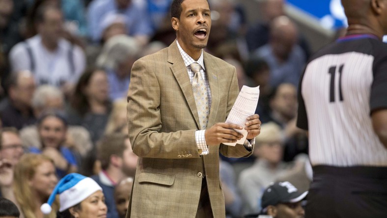 Mavericks' Stephen Silas during NBA game against the Hawks.