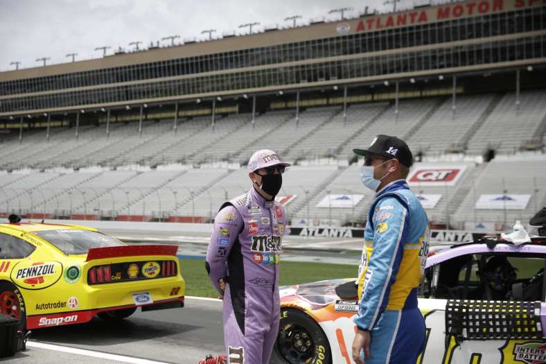 Clint Bowyer and Kyle Busch ahead of NASCAR race