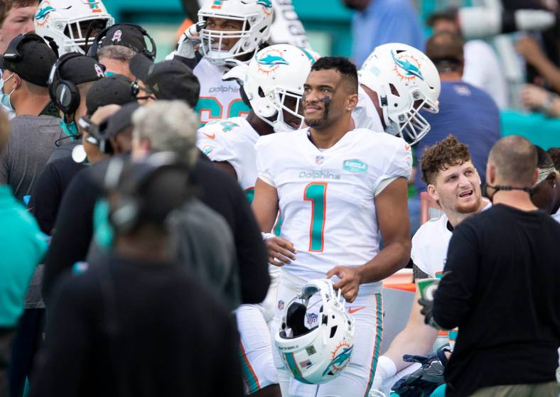 Miami Dolphins quarterback Tua Tagovailoa (1) watches replay of fumble on his first series of downs against the Los Angeles Rams at Hard Rock Stadium in Miami Gardens, November 1, 2020. (ALLEN EYESTONE / THE PALM BEACH POST)